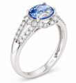 18KT GOLD OVAL BLUE SAPPHIRE AND DIAMOND RING